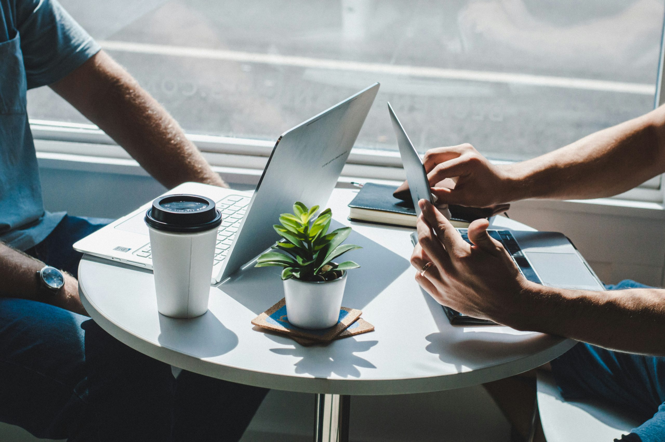 Two people working at a cafe.